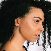 AELLA // greek amazon warrior two-tone hoop earrings  on model