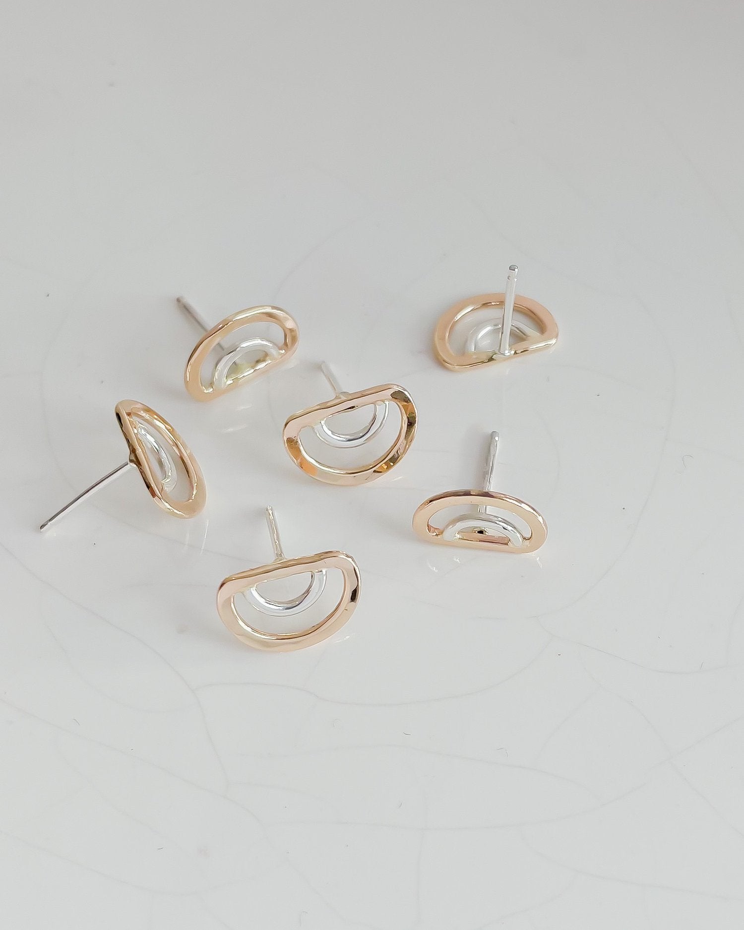 SUN & SELENE two tone arc studs