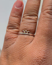 SUN & SELENE garnet ring on model