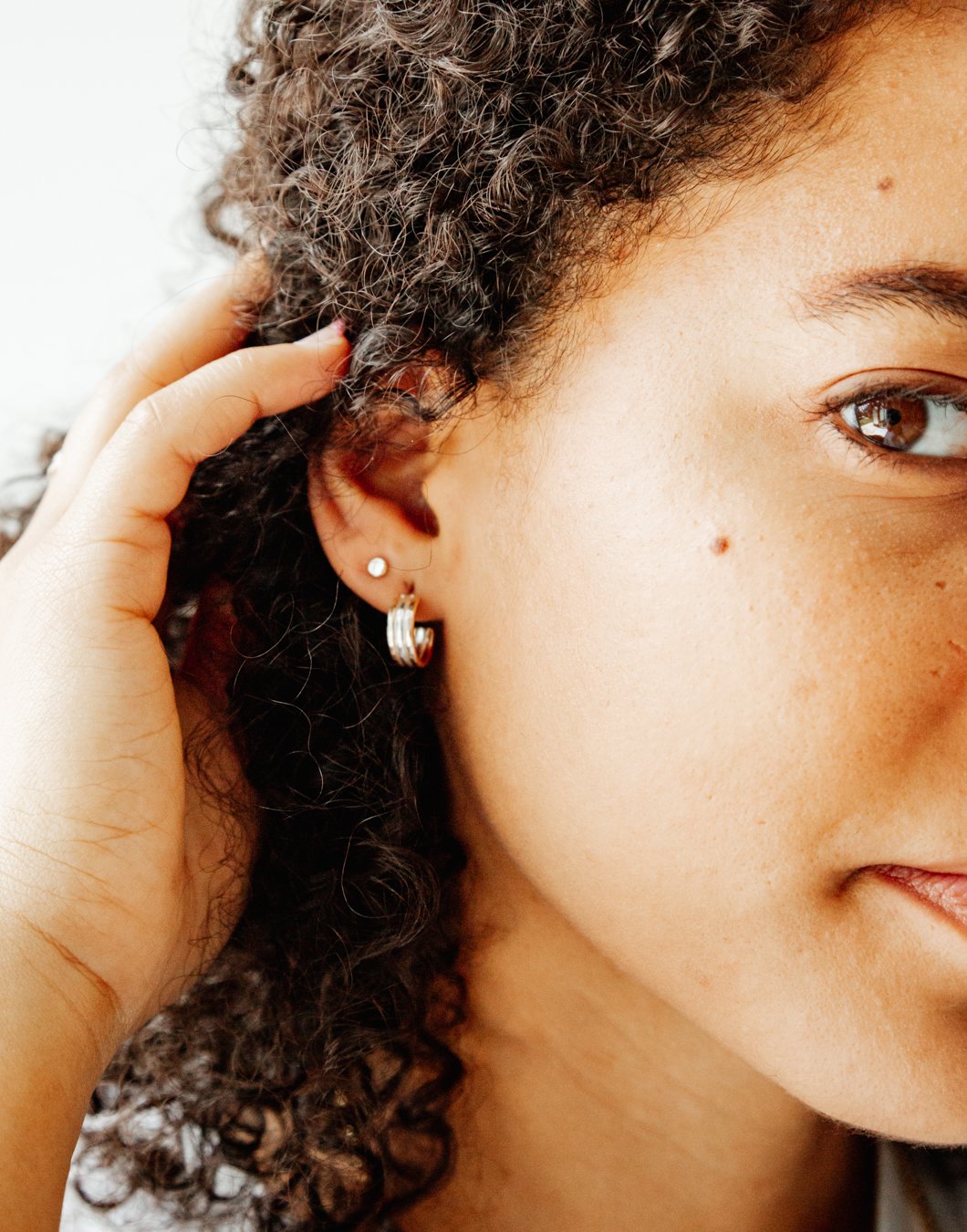 SUN & SELENE equator cuff hoops on model