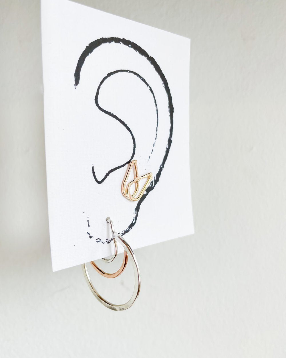 SUN & SELENE earrings on card