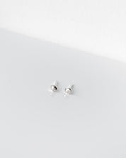SUN & SELENE silver pebble studs
