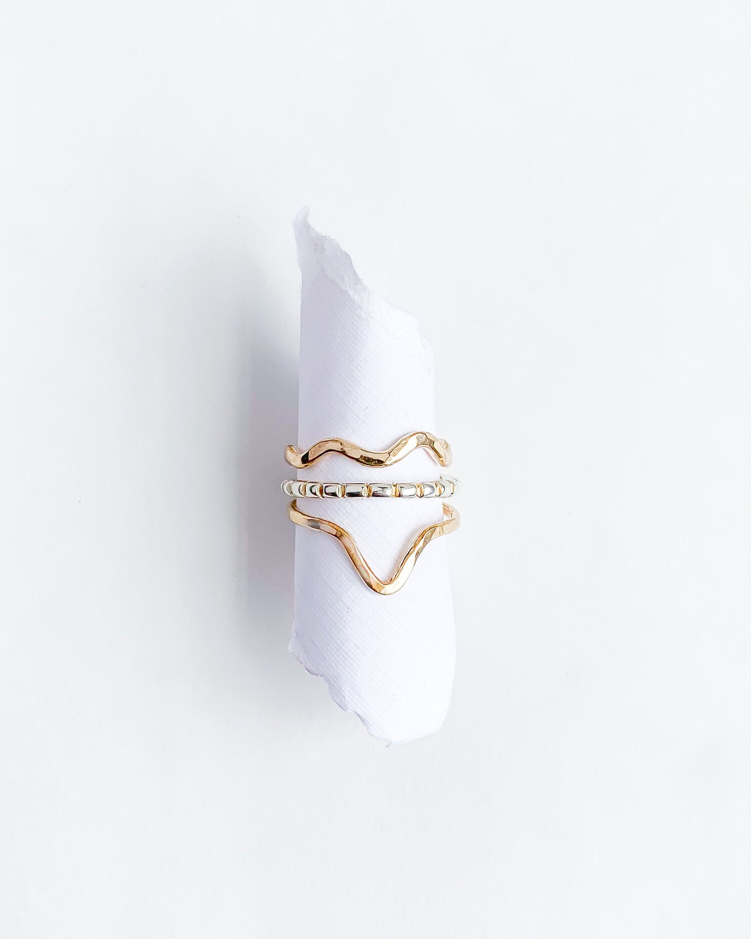SUN & SELENE stacking rings on form