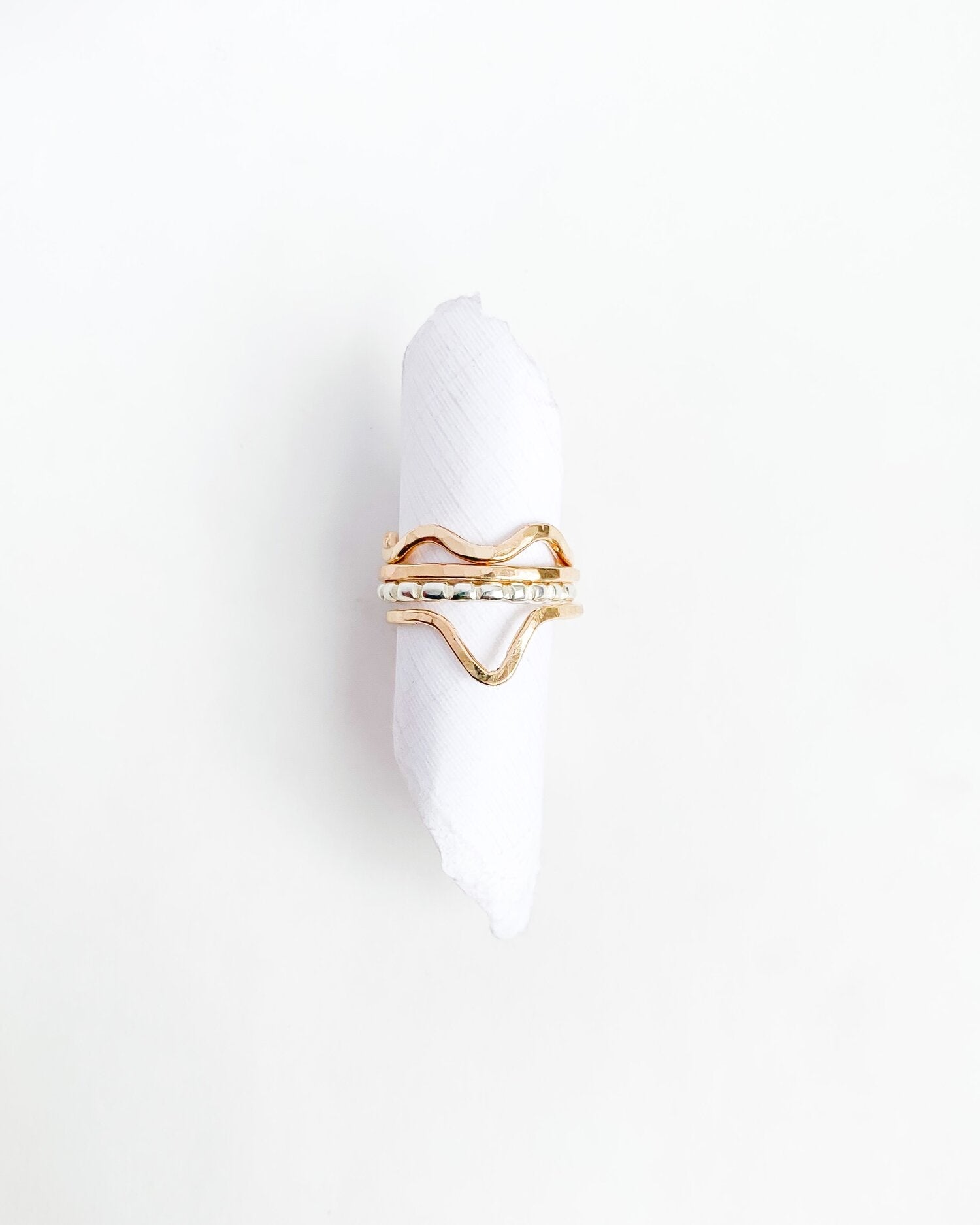SUN & SELENE stacking rings on form