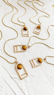 SUN & SELENE tiger's eye arc necklaces