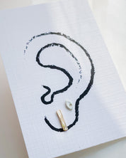 SUN & SELENE earrings on card