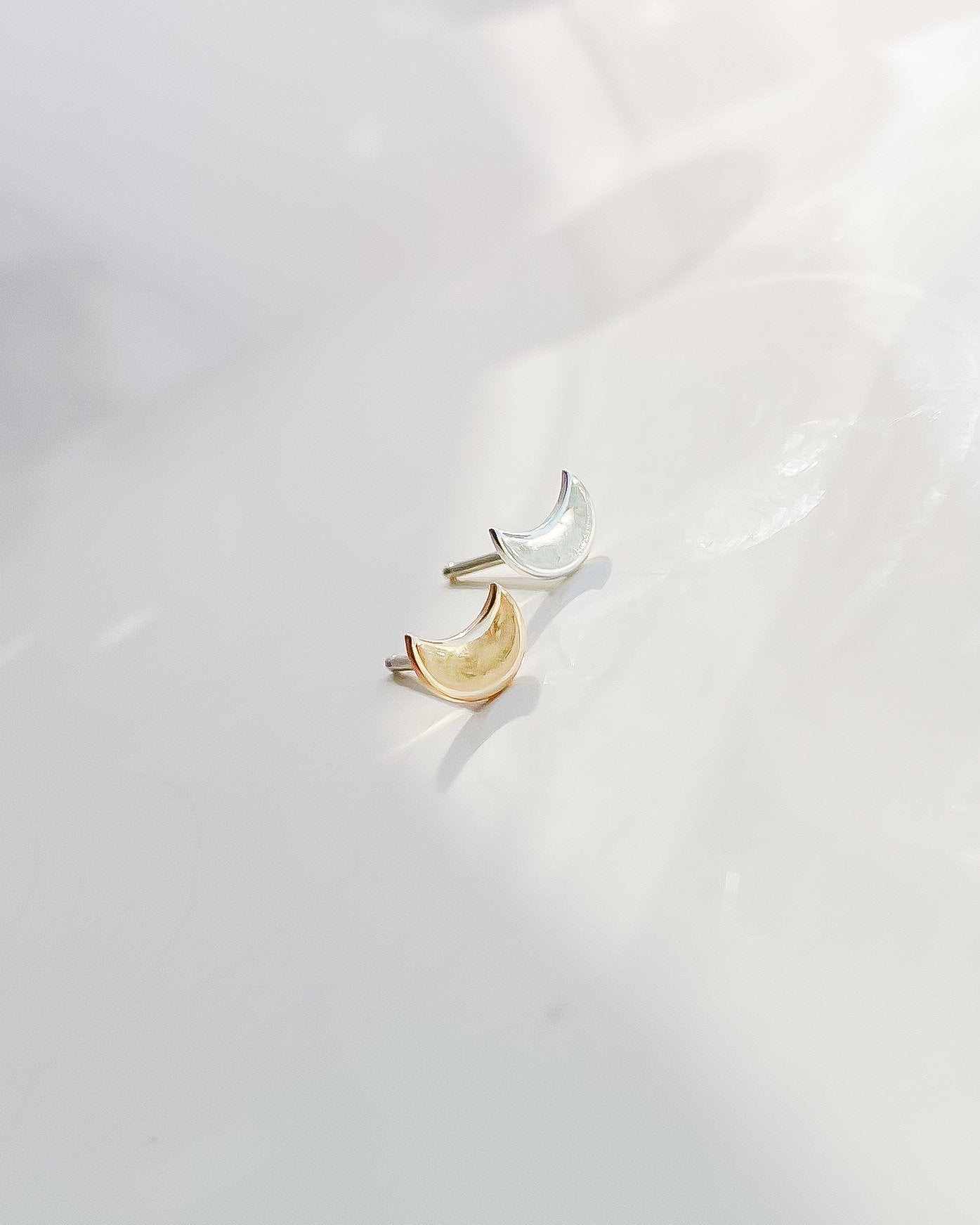 SUN & SELENE tiny crescent stud earrings