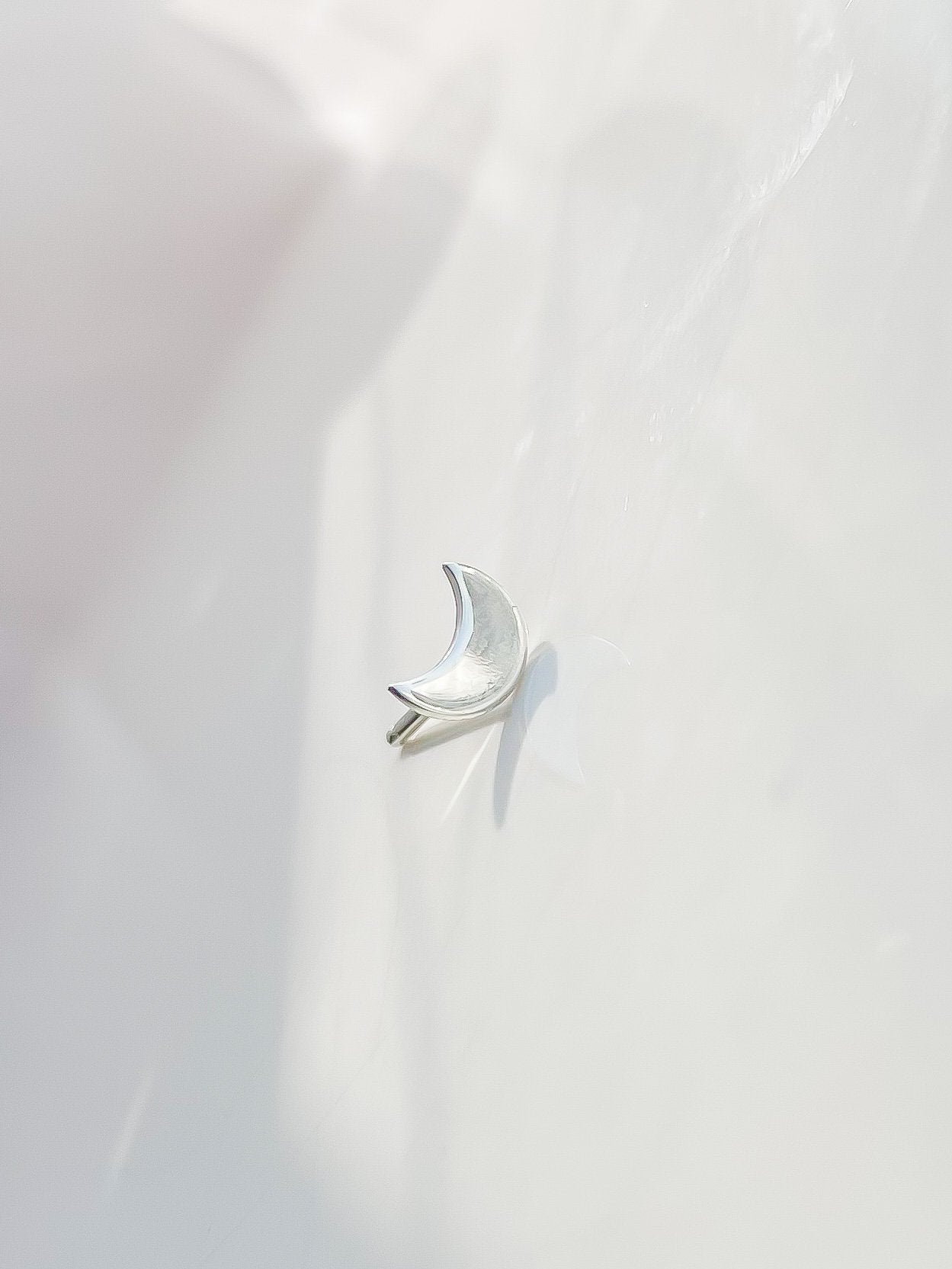 SUN & SELENE silver crescent stud