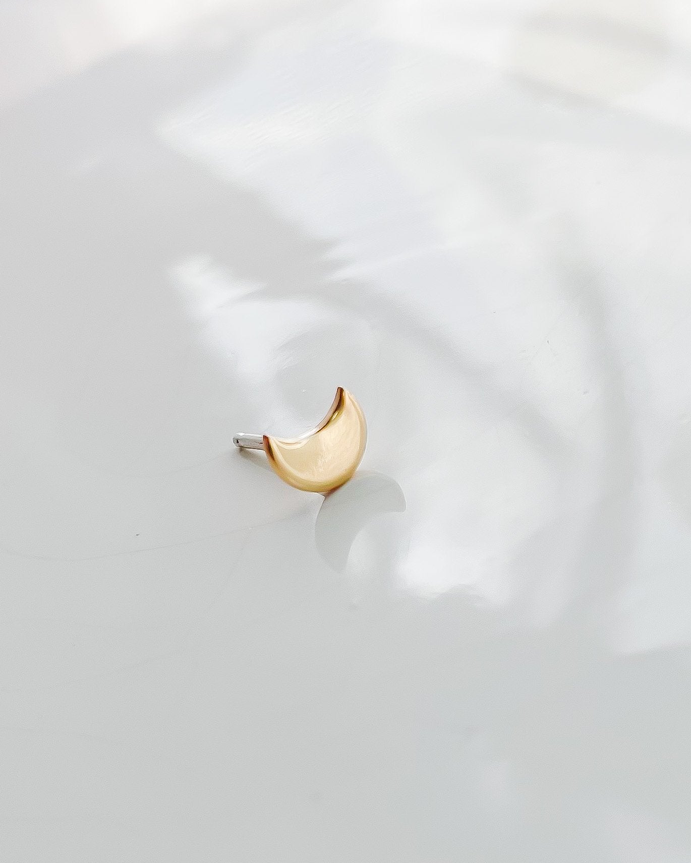 SUN & SELENE gold crescent stud