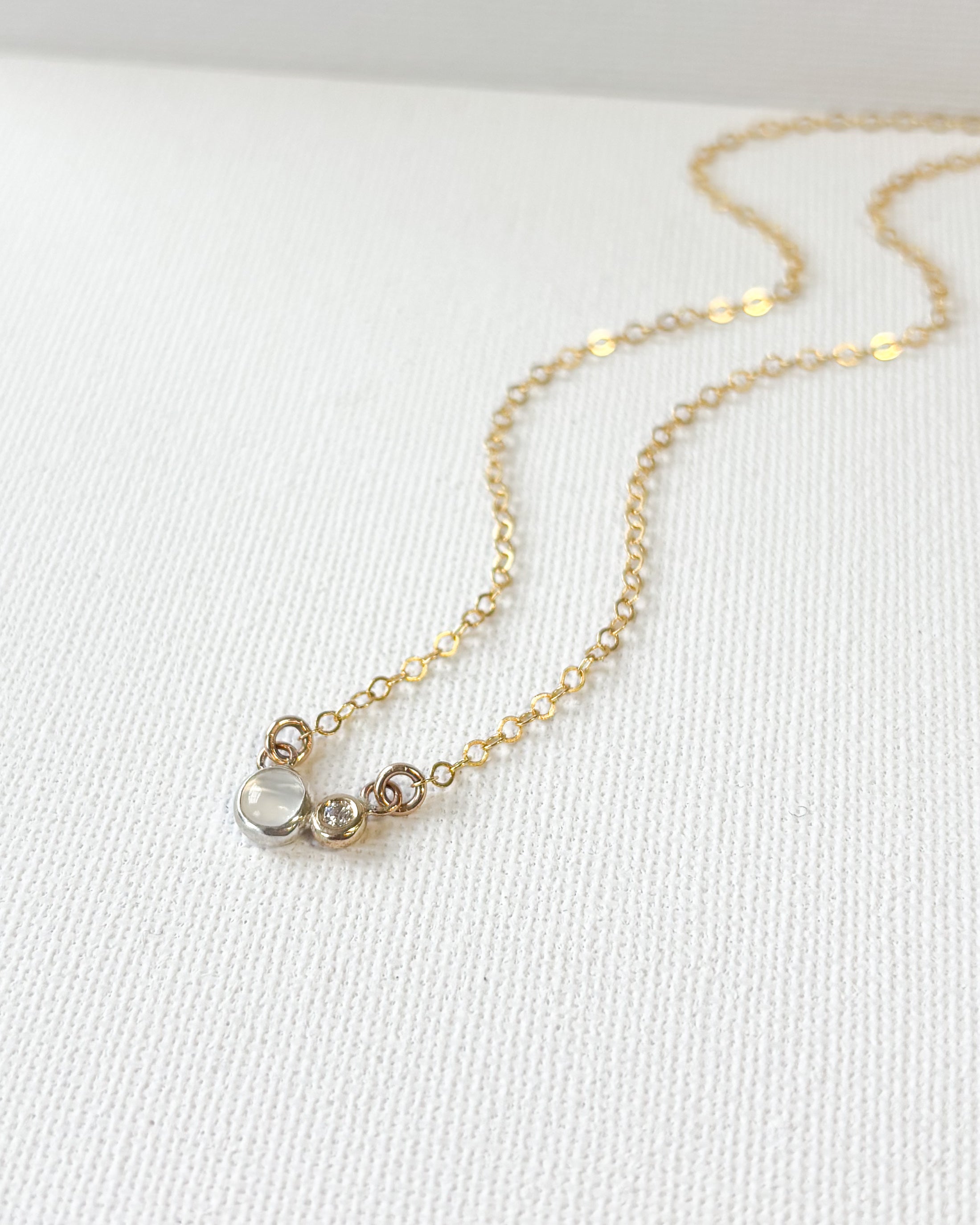 LUMINARY// shadow and light necklace