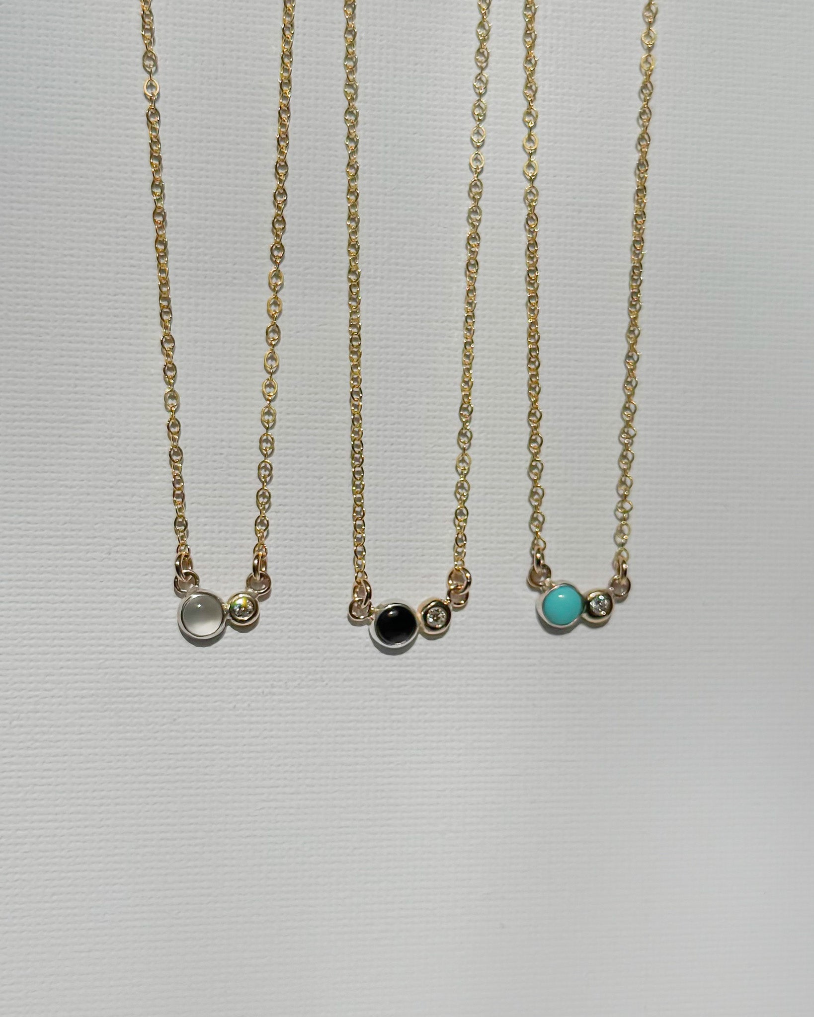 LUMINARY// shadow and light necklace