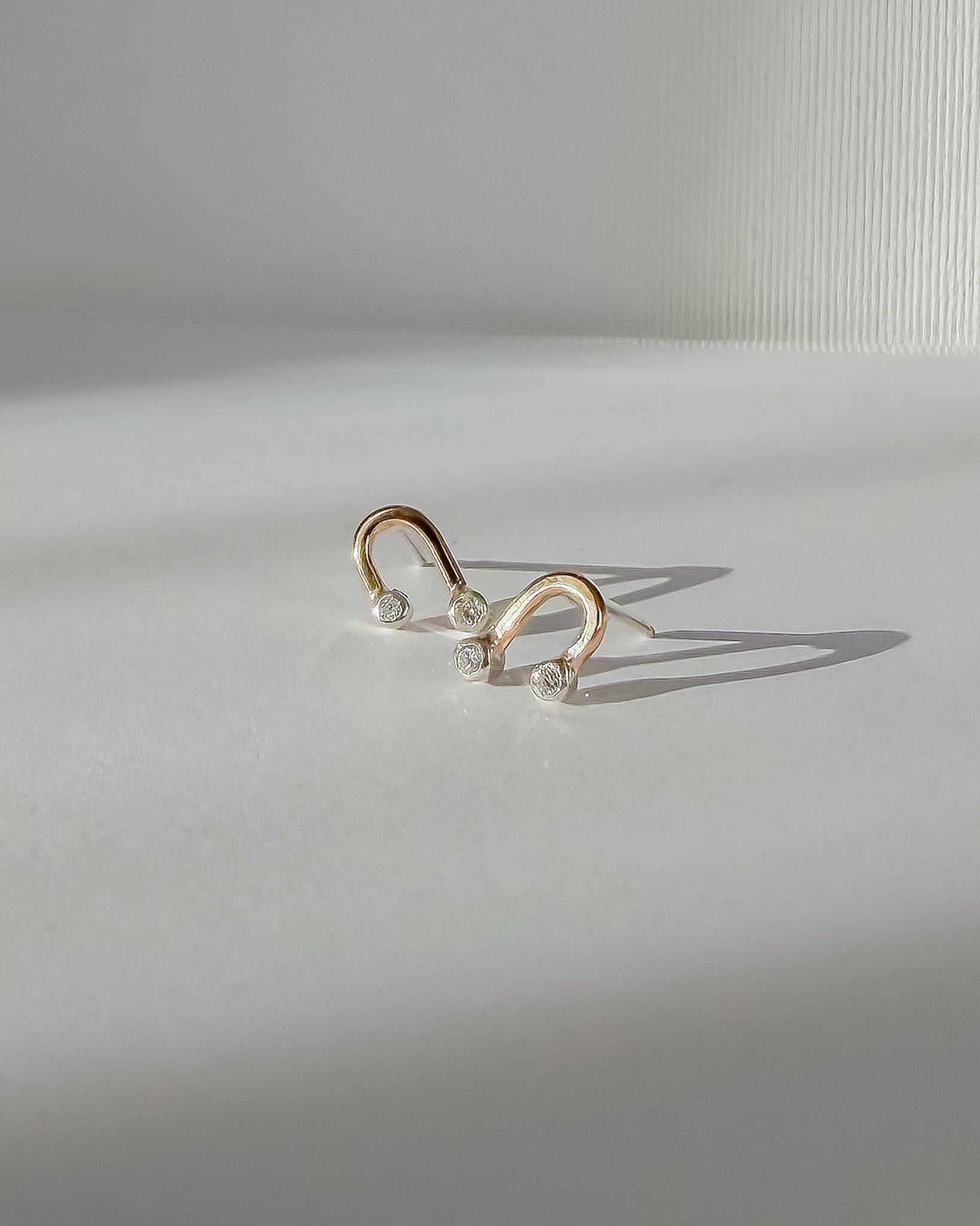 DIAMOND DRIP // tiny arc studs