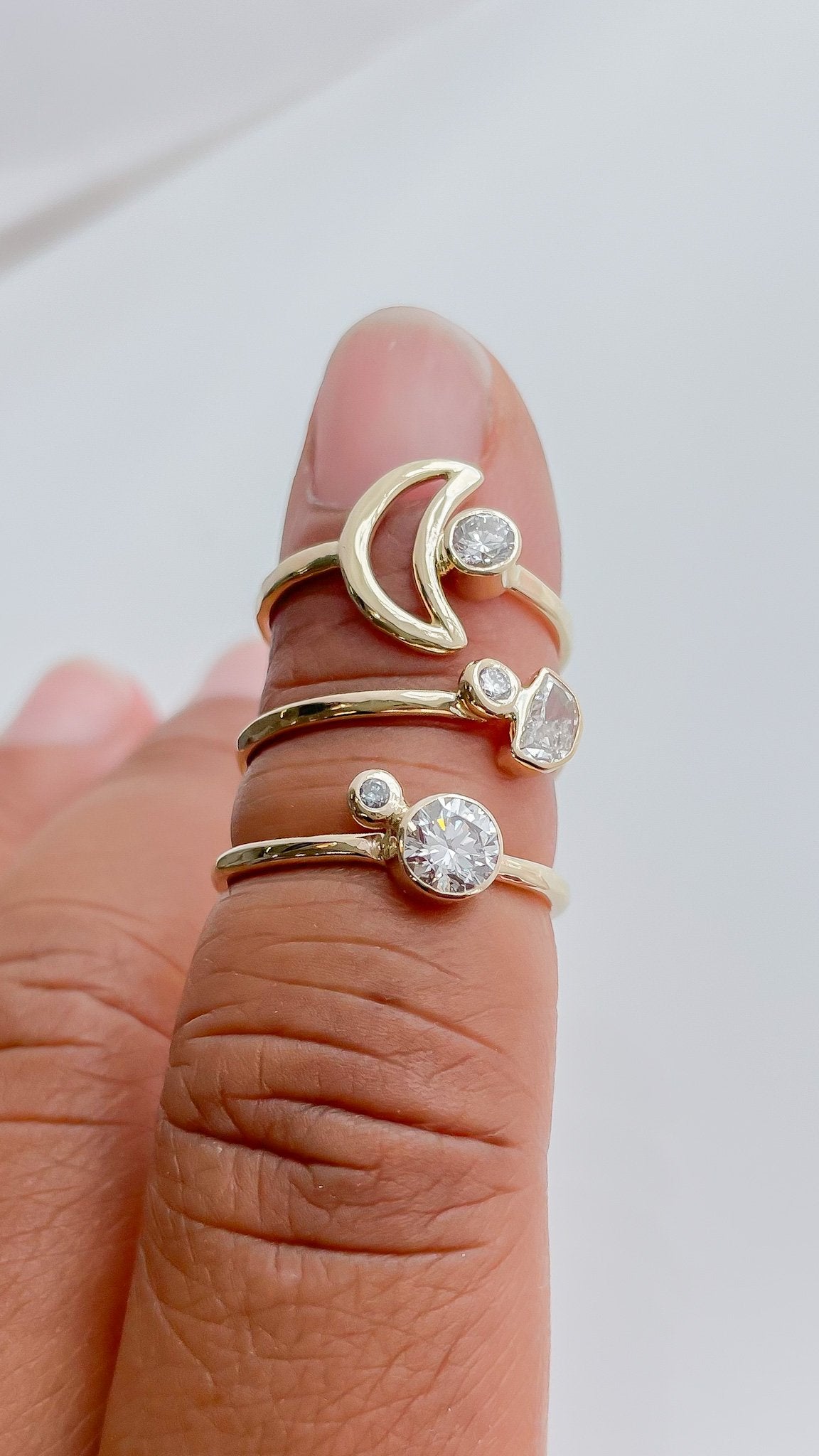 SUN & SELENE handcrafted rings on model 
