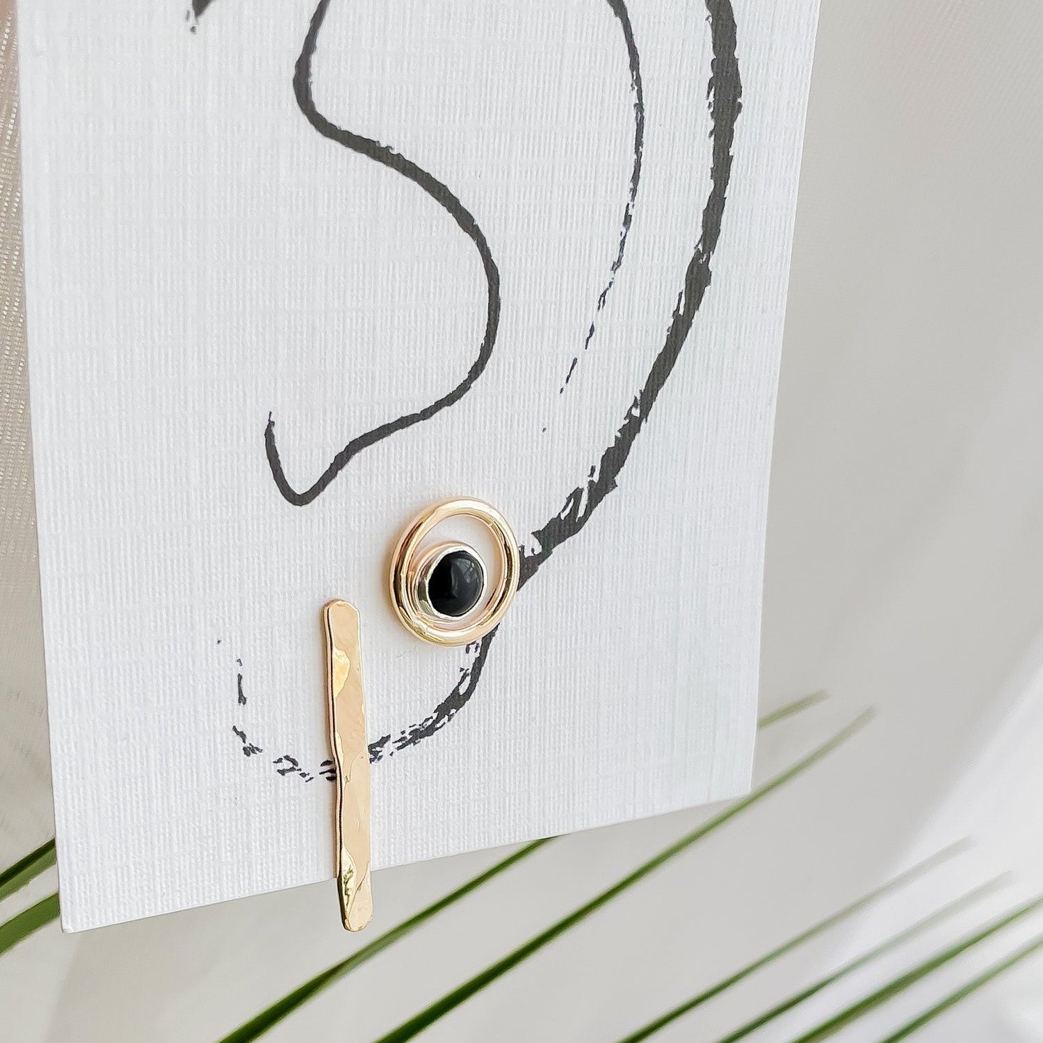 SUN & SELENE earrings on card