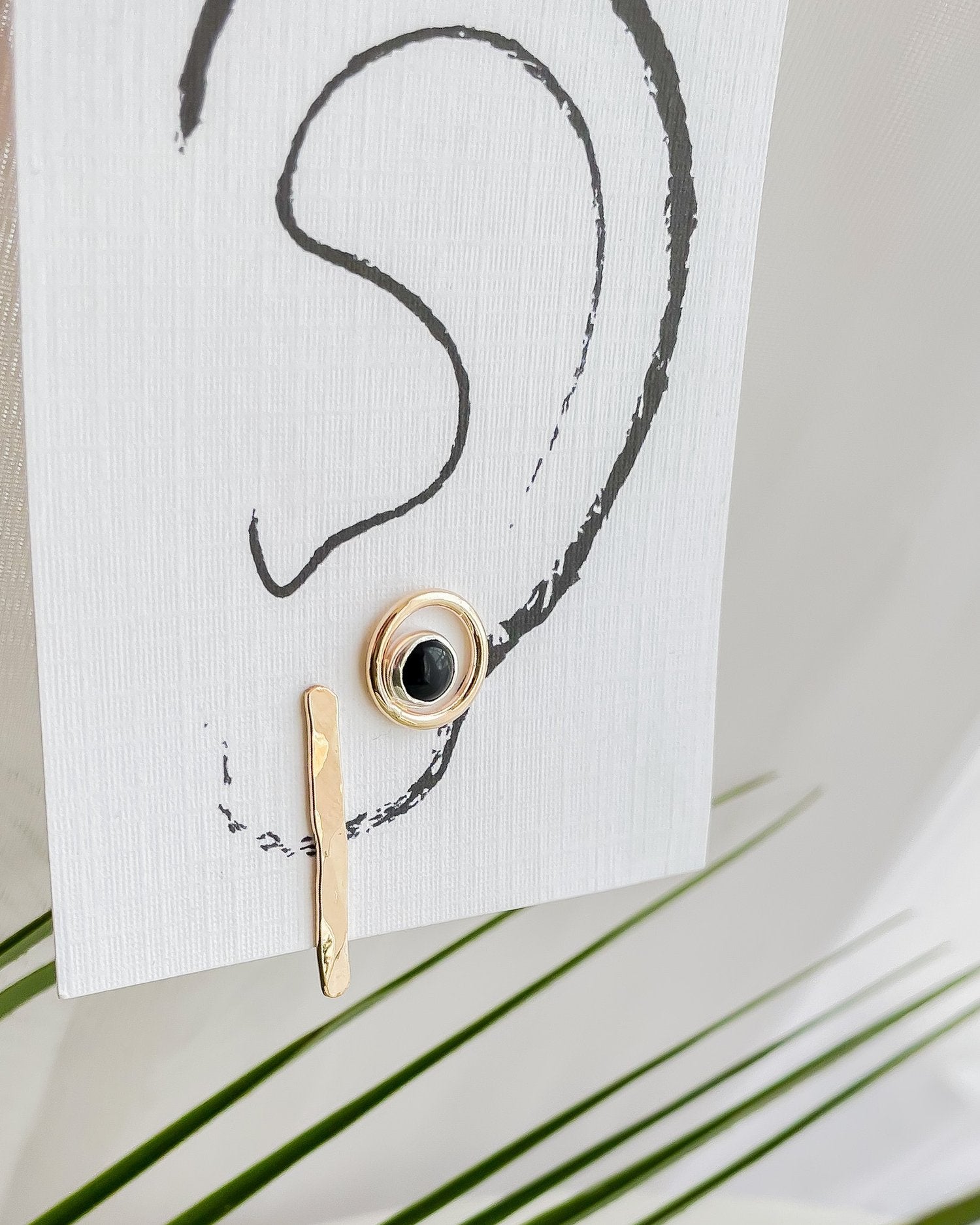 SUN & SELENE earrings on card