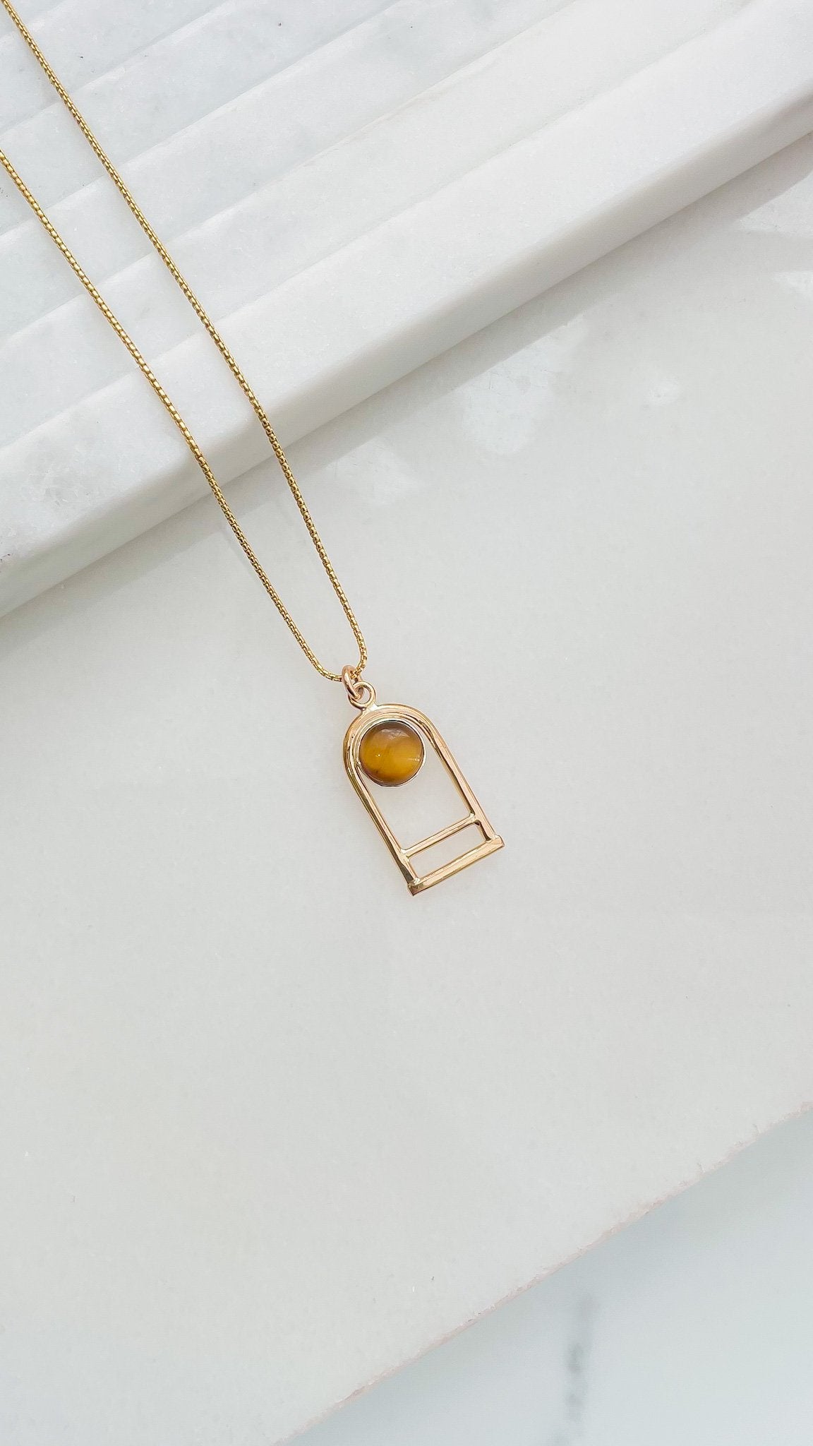 SUN & SELENE tiger's eye arc necklace