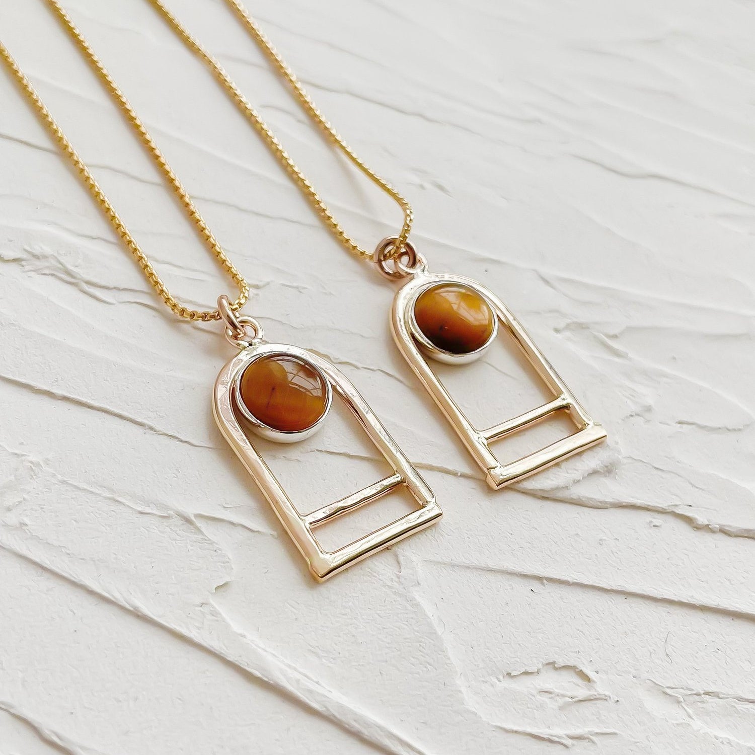 SUN & SELENE tiger's eye arc necklaces