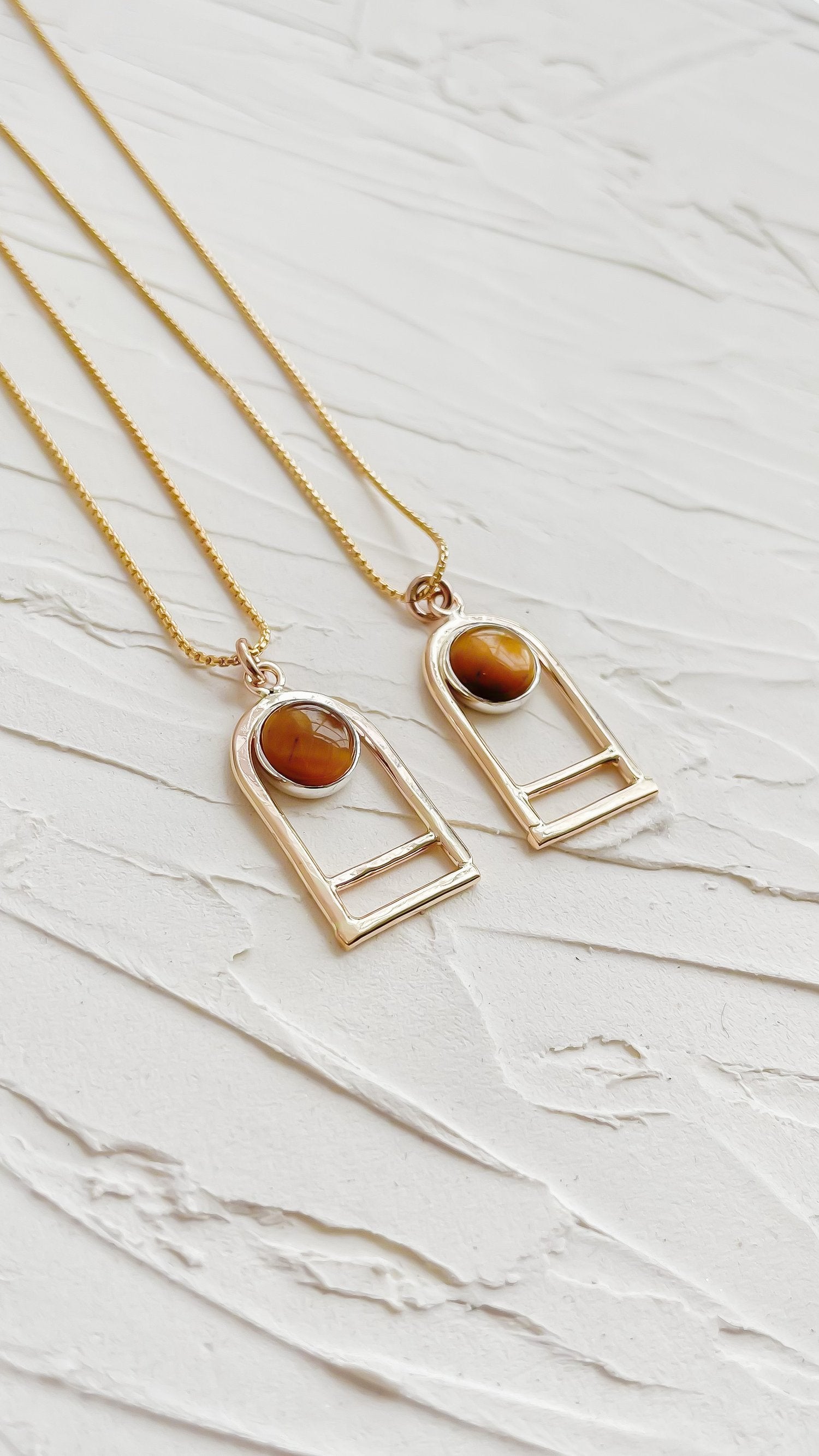 SUN & SELENE tiger's eye arc necklaces