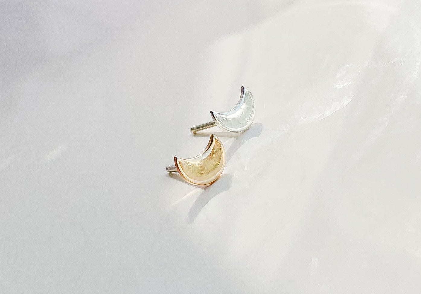 SUN & SELENE tiny crescent stud earrings